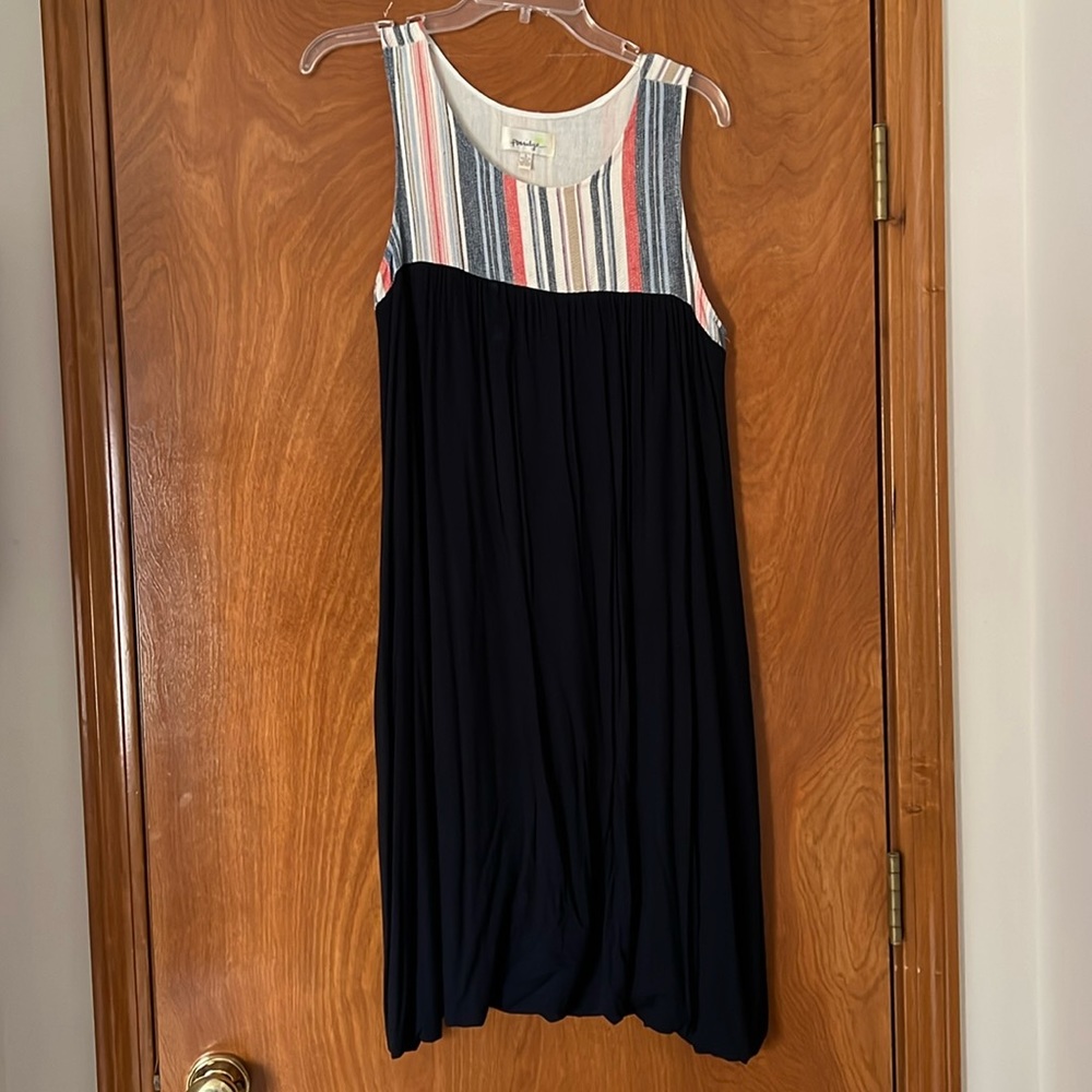 Navy tank dress with striped navy, tan, Cream, and coral top.